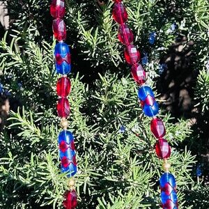 Vintage monet faceted deep cherry lucite beads